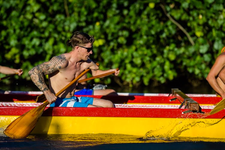 Forge leader and arm amputee Logan adaptively paddles in a kayak in Kauai.